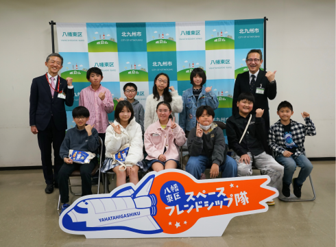 帰還報告会での集合写真