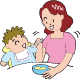 母親が離乳食を食べさせているイラスト